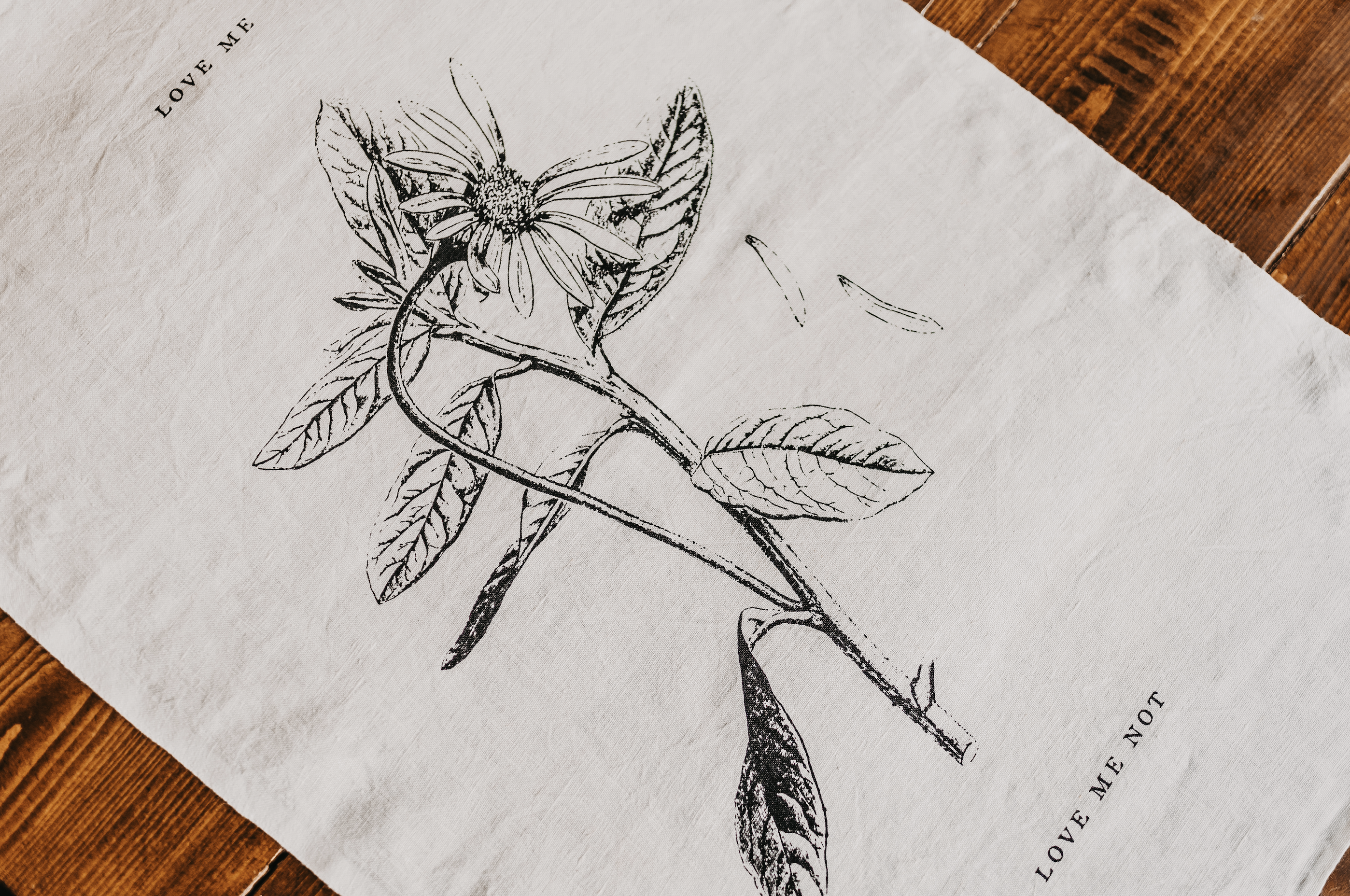 "Love Me, Love Me Not" Tea Towel